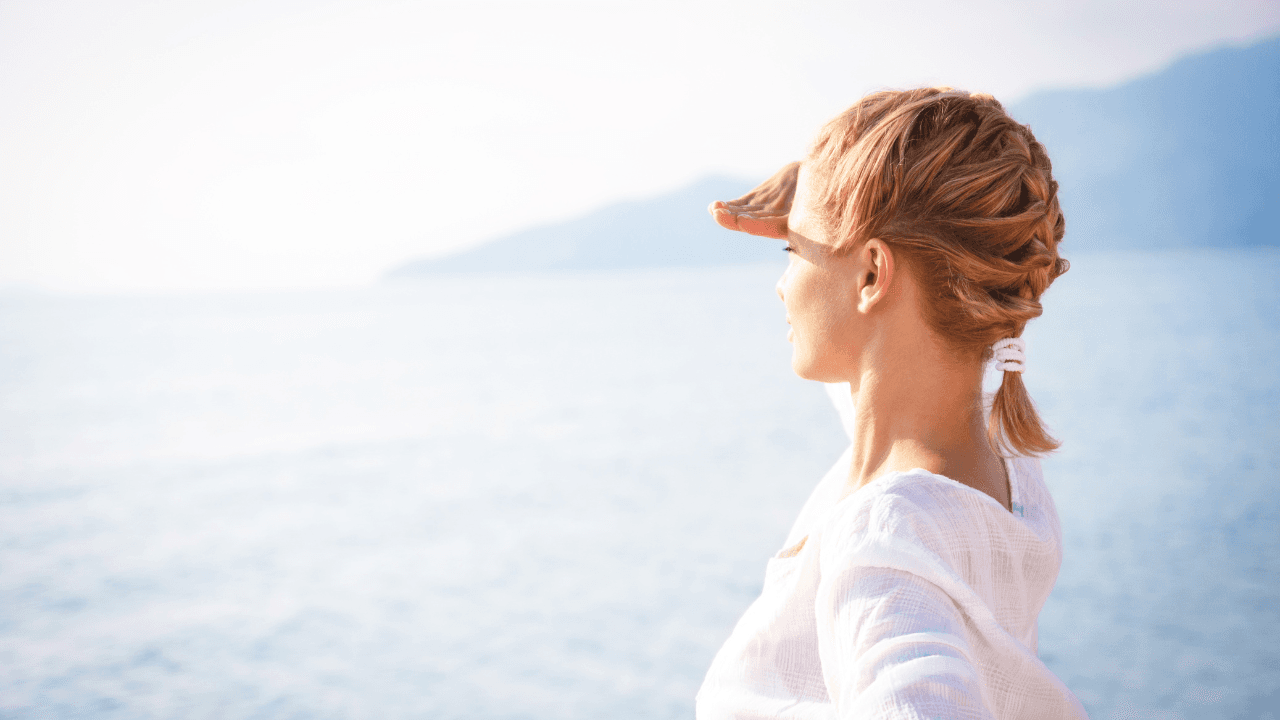 A woman looking out over the water.